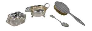A George V sauceboat, with flying acanthus leaf handle, flared rim and triple hoof feet, by H H...