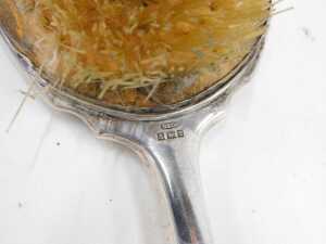 A George V sauceboat, with flying acanthus leaf handle, flared rim and triple hoof feet, by H H... - 10