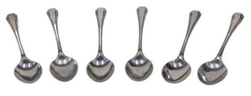 A set of six George V silver teaspoons, bright cut decorated with plain bowls, by Thomas...