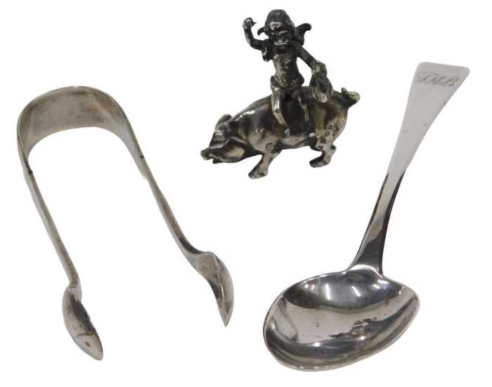 A late 19thC miniature figure group of a cherub riding pig, Chester import marks 1898, 3cm high,...