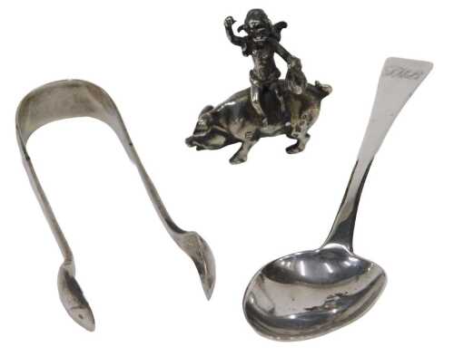 A late 19thC miniature figure group of a cherub riding pig, Chester import marks 1898, 3cm high,...