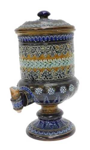 A 19thC Doulton Lambeth water filter, with compressed domed lid, the cylindrical body profusely...