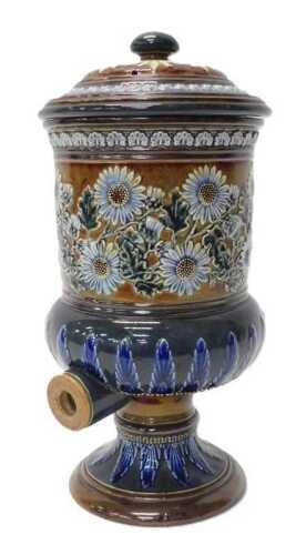 A late 19thC Doulton Lambeth stoneware water filter, the compressed domed lid and cylindrical...