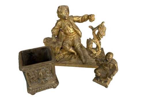 Three brass items.