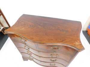 A George III mahogany serpentine bachelor's chest, with moulded top over two drawers, over... - 3