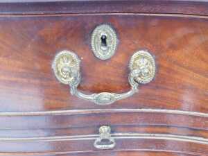 A George III mahogany serpentine bachelor's chest, with moulded top over two drawers, over... - 4
