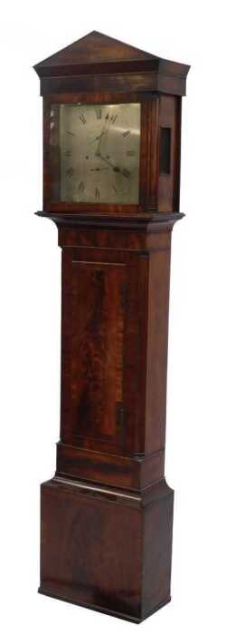 A Regency flame mahogany longcase clock, the arched hood with quarter inset columns, over a...