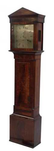 A Regency flame mahogany longcase clock, the arched hood with quarter inset columns, over a...