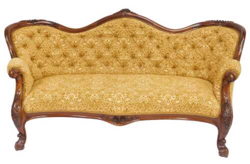 A Victorian mahogany serpentine three-seater showframe sofa, with a button back and overstuffed...