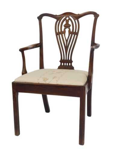 A George III mahogany carver chair, with a pierced-shaped splat, drop-in seat, raised on square...