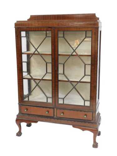A 20thC mahogany display cabinet, with a raised back above astragal-glazed doors and glass side...