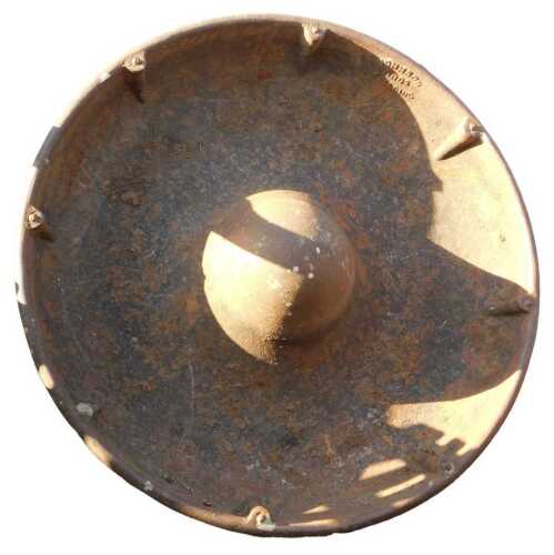 A Mexican hat cast metal animal feeder, 89cm diameter.