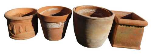 A group of terracotta plant pots, including a square-shaped example with a beaded border, 36cm...