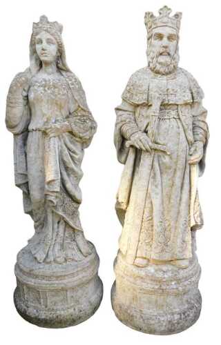 A pair of composition stone garden statues, each modelled as a medieval king and queen, on a...