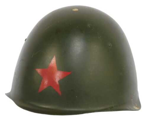 A post-war Russian steel military helmet, painted in green with a star, with tan coloured...