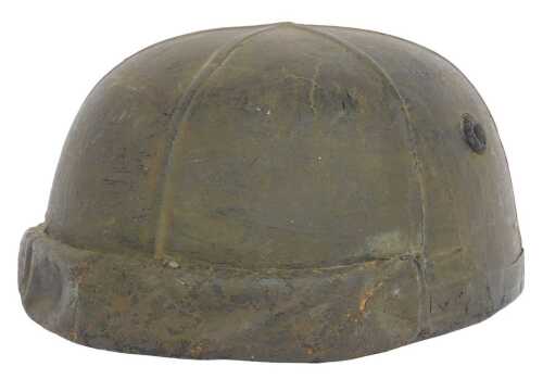 A World War II British fibre tank helmet, with six segments, aeration holes and shallow peak,...
