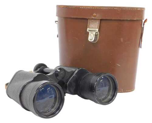 A pair of Japanese Greenkat 10x50 binoculars, in a leather case.