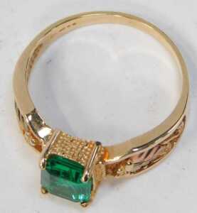 A 9ct gold QVC dress ring, set with a light green rectangular cut stone, possibly spinel, with a... - 2