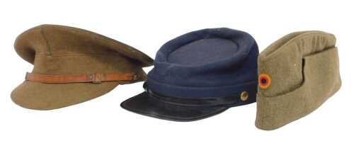 A British Army officer's khaki cap, with leather band and black interior, a West German Army cap,...