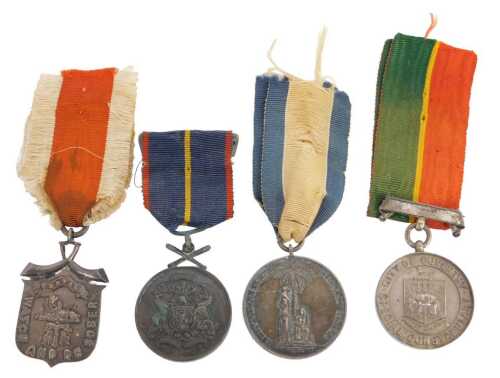Four various medals, The Royal Watch and Be Sober Award, The Cardiff City Special Police Award...