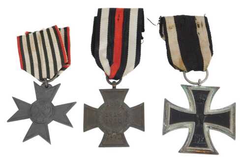 Three German First World War medals, a World War I War Service Cross, a 1914 Iron Cross, and a...