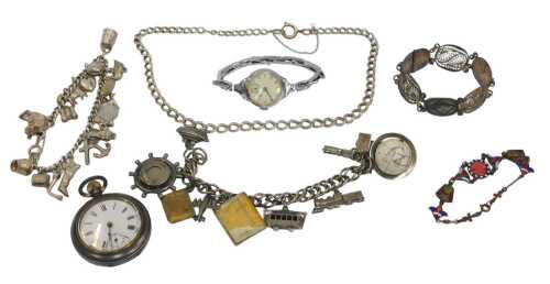 A group of silver and other jewellery, comprising a silver charm bracelet, with assortment of...