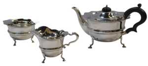 An early 20thC silver three-piece tea service, comprising teapot, milk jug and sugar bowl, each...