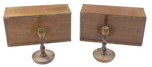 Two 20thC stained oak boxes, each of rectangular form with a sliding lid enclosing a...