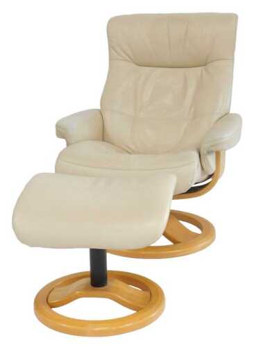 An early 21stC Stressless type cream leather armchair and stool, 80cm wide.