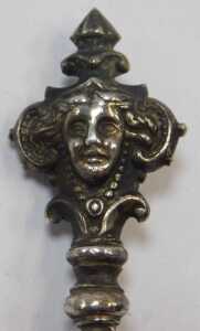 A Continental white metal spoon, with a twisted handle and figure head terminal, stamped 800,... - 3