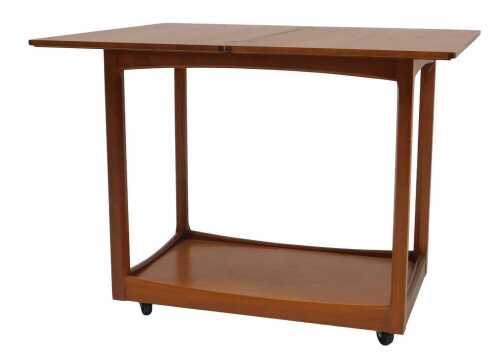 A Legate teak trolley/tea table, the rectangular hinged top, on chamfered supports with...