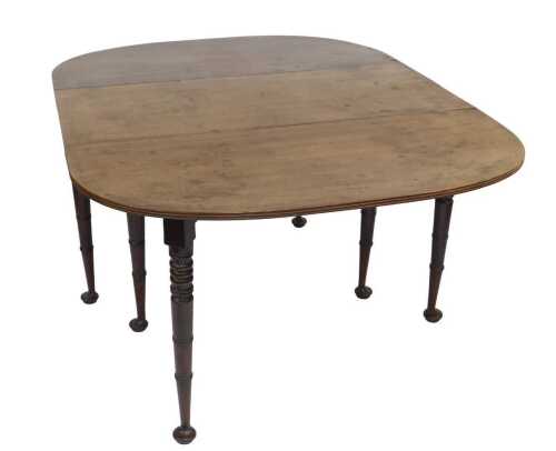 A 19thC mahogany drop leaf table, the top with rounded corners and a reeded edge, on turned...