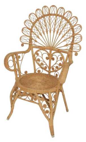 A rattan peacock type open armchair, with splayed legs, 85cm wide.