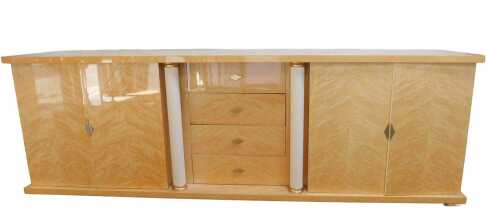 An Italian birdseye maple side cabinet, having a rectangular top with silvered metallic...