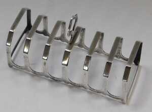 A George VI silver six division toast rack, Henry Pidduck and Sons, Birmingham 1938, 1.61oz,... - 2
