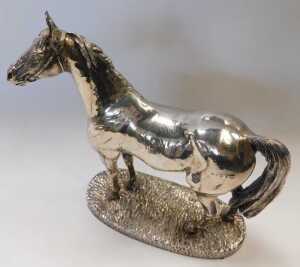 An Elizabeth II loaded silver model of a horse, wearing a bridle and bit, mounted on a... - 3