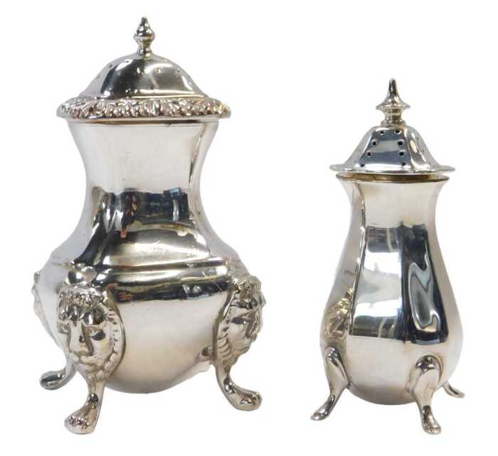 A George VI silver pepper pot, of faceted tapering form, raised on hoof feet, Birmingham 1948, 1....