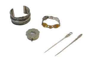 A group of white metal items, comprising an Eastern bangle, a Siam jewellery enamel bracelet,...