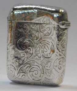 A late Victorian silver Vesta case, decorated with scrolls and leaves, Birmingham 1891, together... - 2