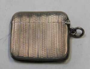 A George V silver Vesta case, with engine-turned decoration and a vacant circular cartouche,... - 2