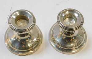 A pair of George V loaded silver candlesticks, of squat form, Birmingham 1922, 3.27oz all in,... - 2