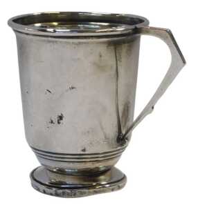 A George VI silver beaker, with lower banded decoration and angular handle, raised on a circular...