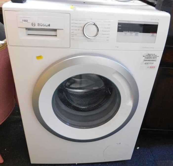 A Bosch washing machine, ECO Silent Drive, Series 4, white.