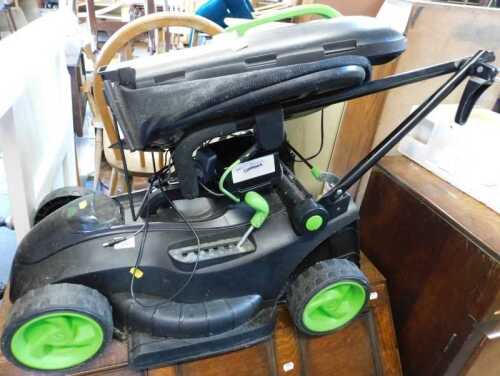 A G-Tech rechargeable electric lawn mower.