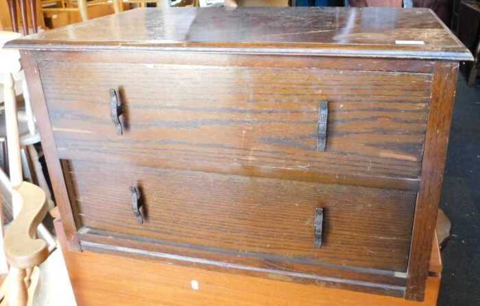 An oak chest, of two long drawers.
