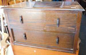 An oak chest, of two long drawers.