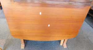 A drop leaf dining table.