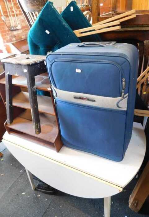A group of furniture, to include a teak bedside cabinet, small stool, raised on square supports,...