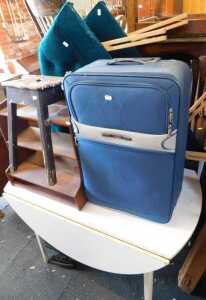 A group of furniture, to include a teak bedside cabinet, small stool, raised on square supports,...