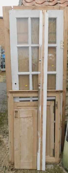 A 2x8 six panel wooden door, together with a painted wooden and multi glass pane door, further...